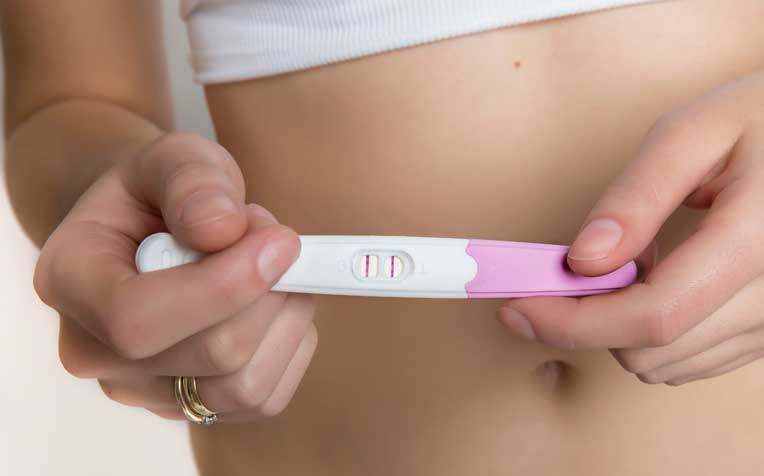 If you suspect you're pregnant, pregnancy test kits may be purchased over-the-counter. They are more than 99% accurate.