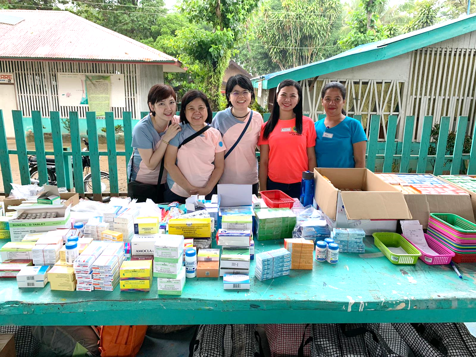 16 Global health team with local nurses.png