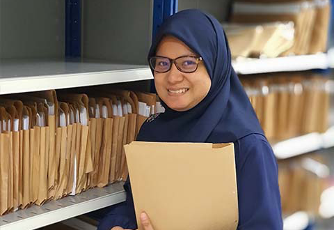 Norbaizurah Rosli from Health Information Management Services - reviews digital medical records at NHCS