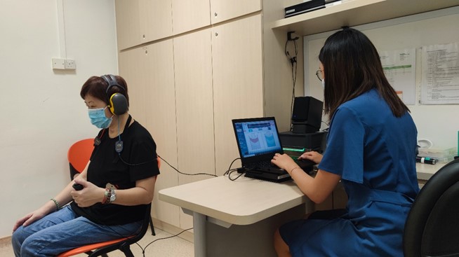 Boothless hearing test in a consult room at TBCHC - SGH